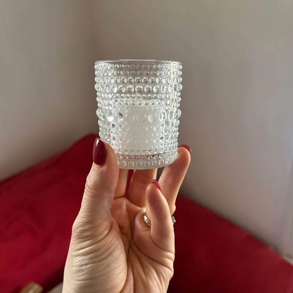 Set of 18 glass votive candle holders with tea lights